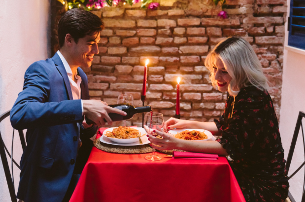 How to Plan a Romantic Celebration With Cake, Flowers, and Wine